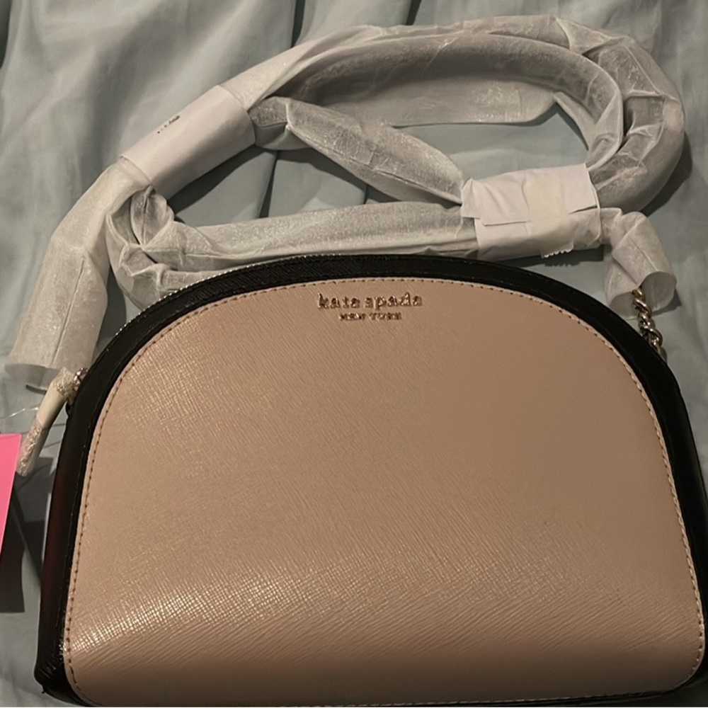Brand new Kate Spade small bag with tags - cost new is $168